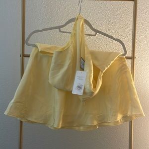 Yellow, flowy dress with mid open center. Brand new. XS from RNWY.